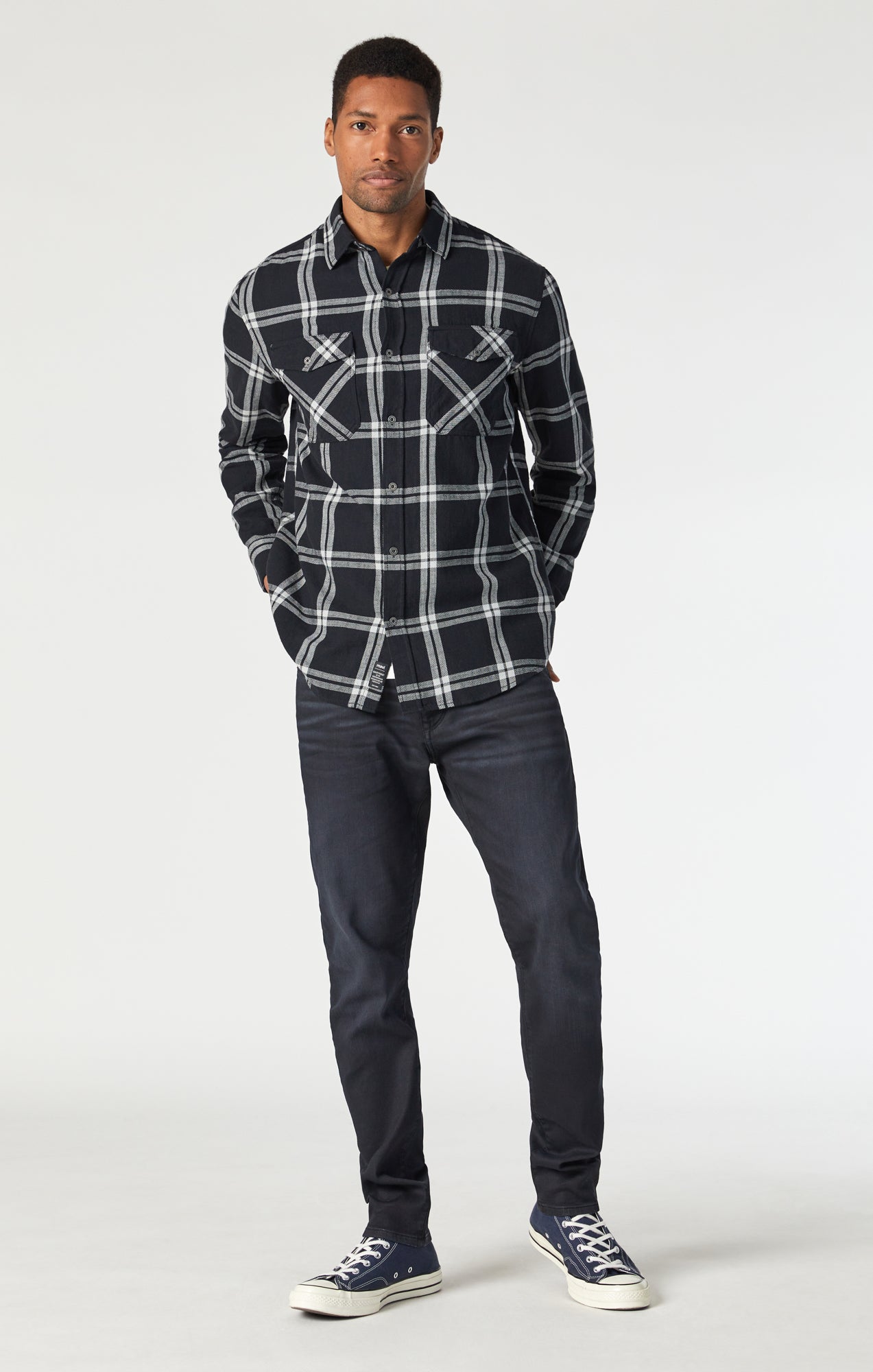 Blue check shops shirt and black jeans