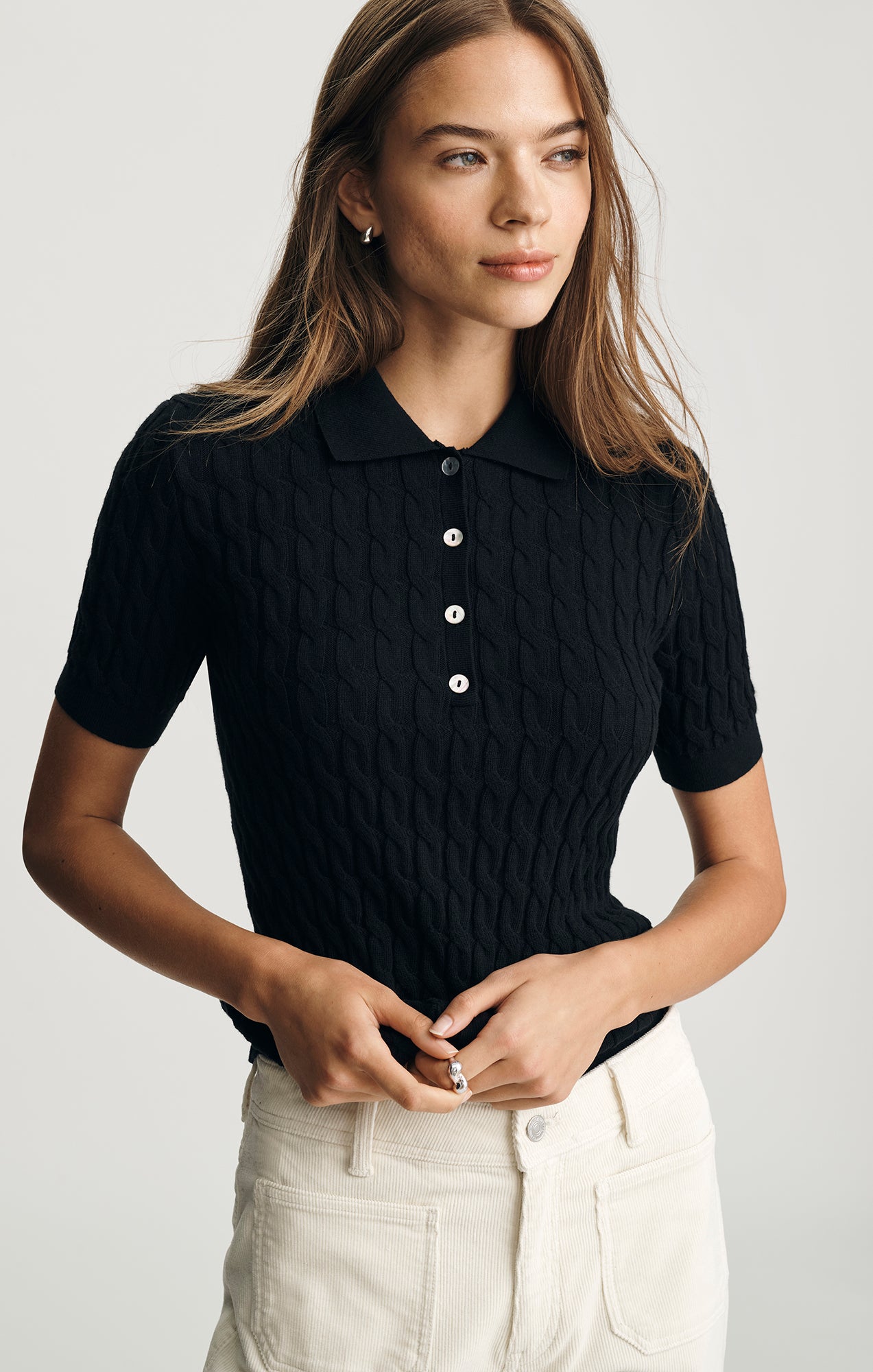 EDITION CABLE-KNIT POLO SWEATER IN BLACK