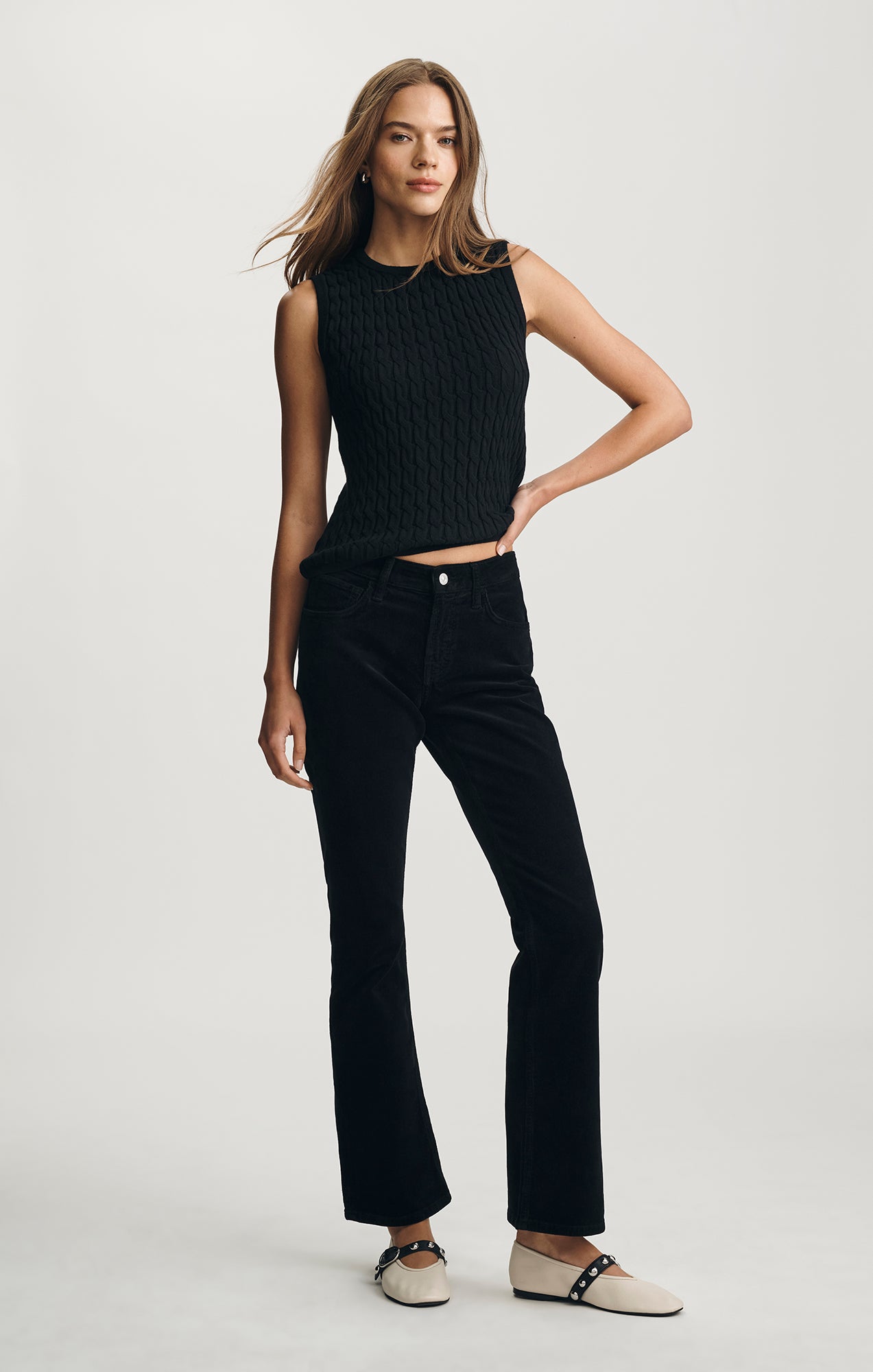 EDITION CABLE-KNIT SWEATER VEST IN BLACK