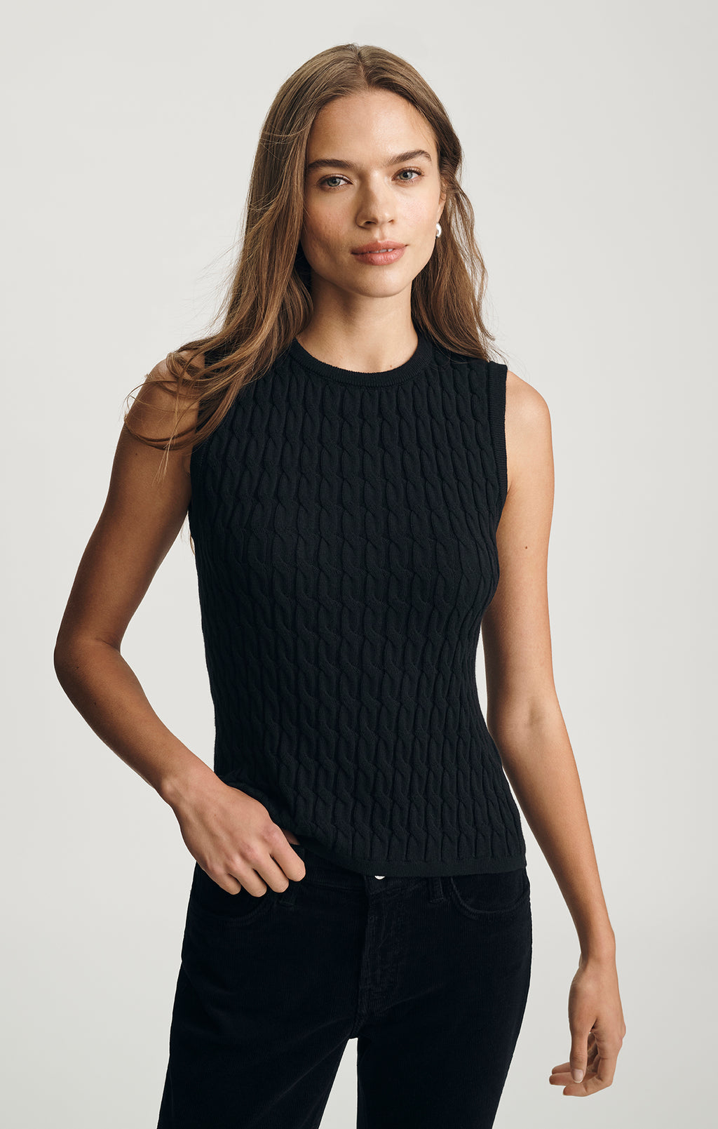 EDITION CABLE-KNIT SWEATER VEST IN BLACK